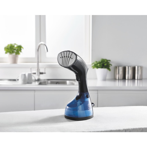 Blue garment steamer - garment,